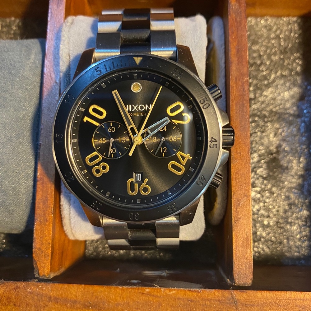 Nixon watch, black and gold
